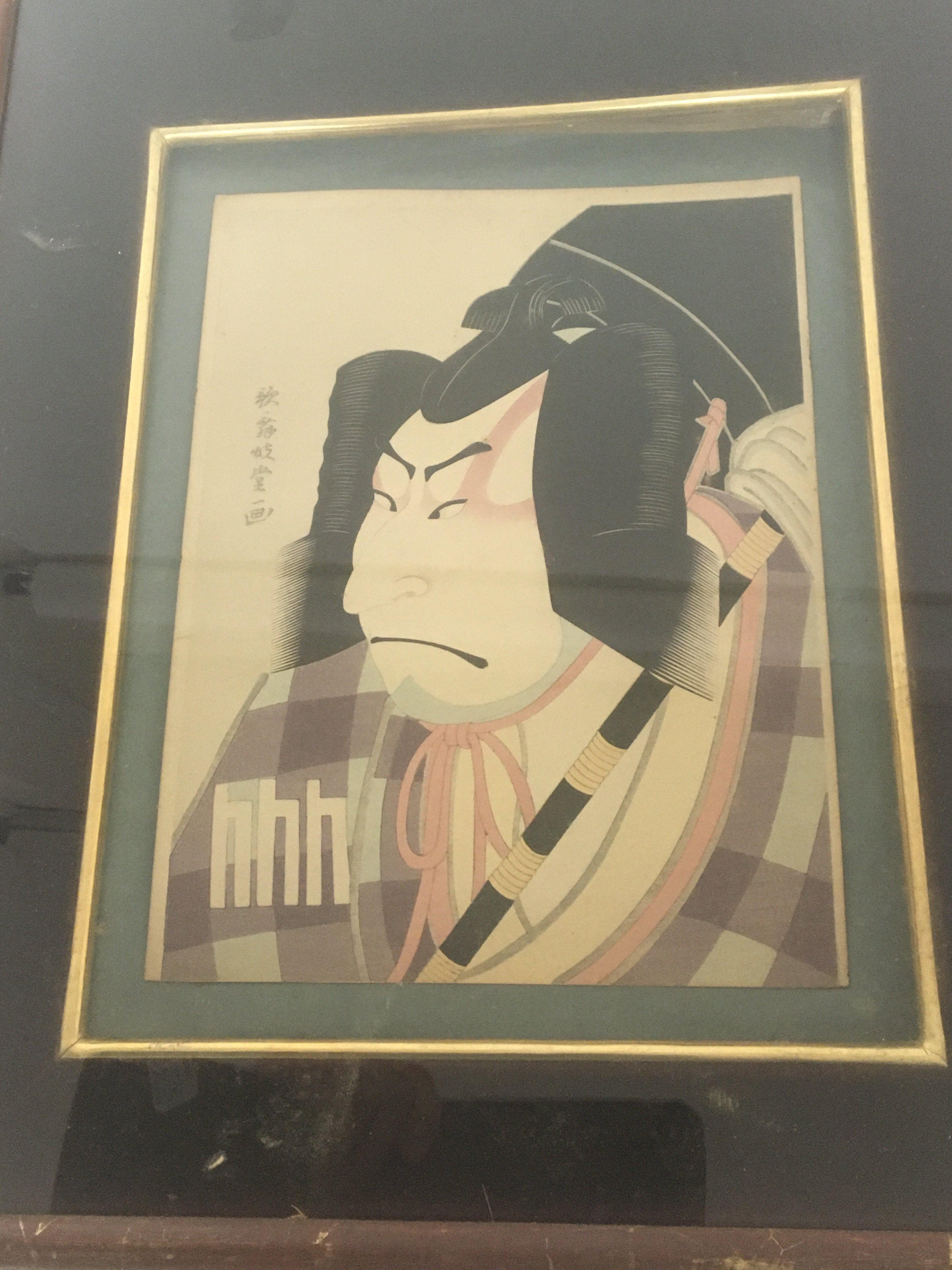 A framed Japanese woodblock print signed.45x38cm -