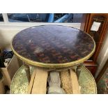 A gilt wooden framed circular table base with a la