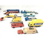A collection of playworn vehicles including Dinky