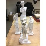 A plaster bust of the Venus De Milo plus other fig