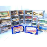 A Box Containing A Collection Of Corgi Classic Truck and Buses.