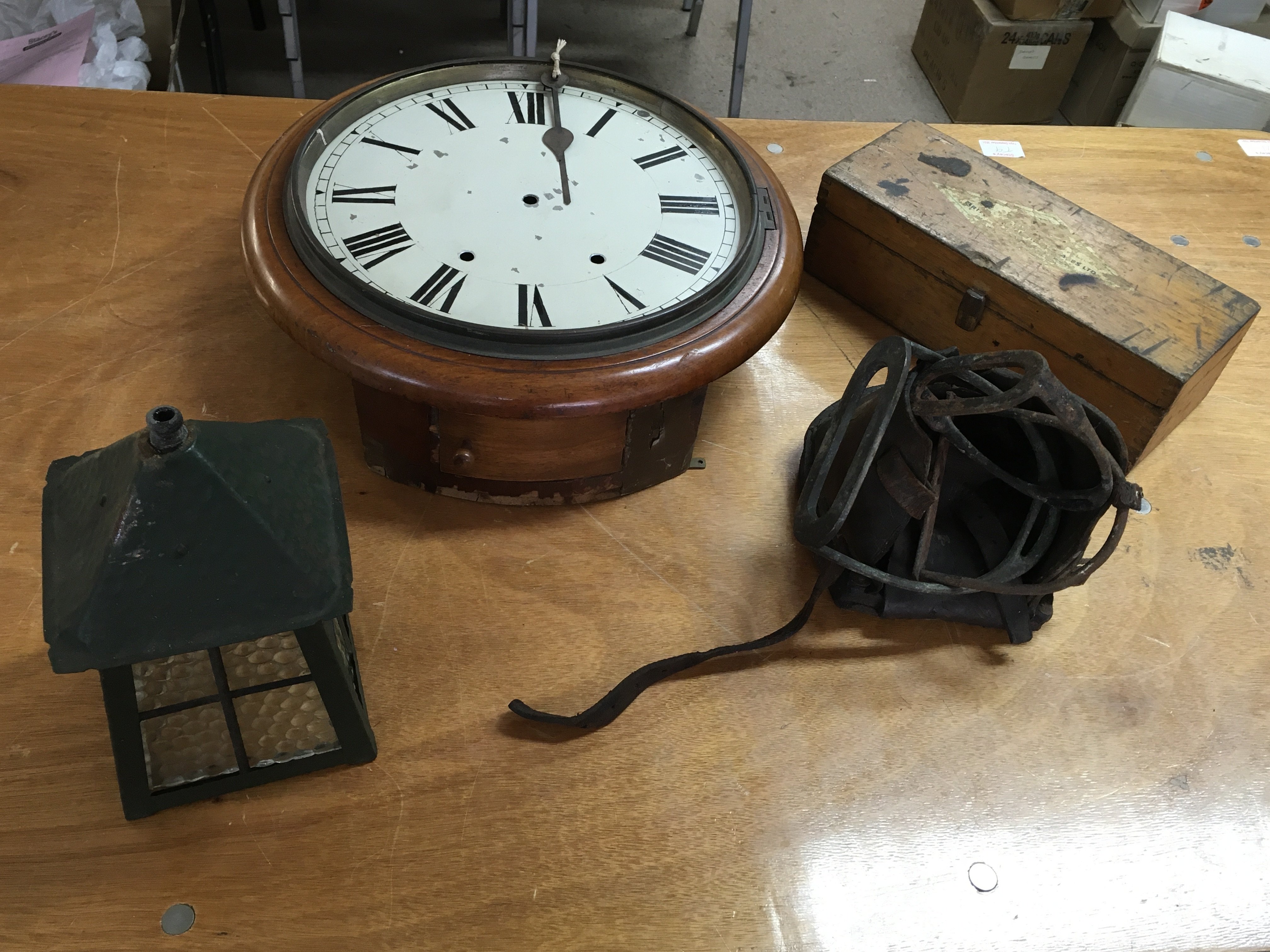 A Victorian round wall clock case with hands but n