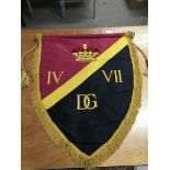 A military style banner with embroidered coronet a