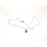 An 18ct white gold, pink tourmaline and diamond pe