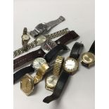 A mixed collection of wrist watches.