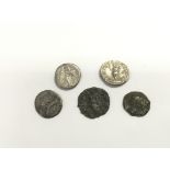 Five ancient coins including Roman examples.