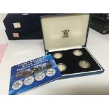 A cased set of four Royal Mint silver proof London