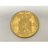 A 1897 10 gulden wilhelmina Dutch coin, approx 6.7