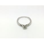 A 9ct white gold diamond ring, approx.60ct, colour