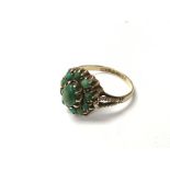 An Edwardian 9ct gold and turquoise set ring. The