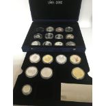 A case containing silver proof coins some from the