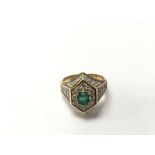 A 9ct emerald and diamond set ring, the approximat