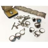 A collection of silver jewellery including rings,