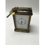 A brass case Mappin and Webb carriage clock .