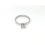 A platinum diamond ring marked 950 set with a prin