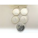 4 x 1 oz 2006 silver Britannia. 1 x 1 oz 2005 silv