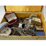 A box of mixed costume jewellery.