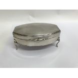 A silver Trickett box the hinged lid with fitted i