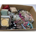 A box of mixed costume jewellery.