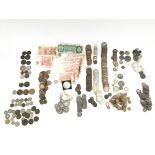 A large collection of assorted coinage and notes i