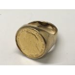 A Victorian Sovereign set in a solid gold ring. We