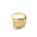 18ct worn half sovereign ring. Approximately 10.5g