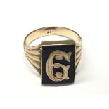 A 9carat gents ring with the letter G. Weight 5.2g