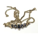 A 9carat gold necklace set with a row of sapphire