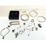 A collection of various silver jewellery including