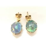 Pair of 9ct gold Opal doublet earrings.