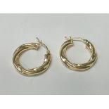 A pair of 9ct hoop earrings.