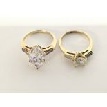 Pair of gold rings. Marked 14kt. Total weight appr