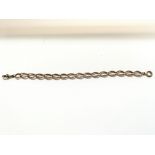 9kt gold curb chain bracelet. Approximately 17g an