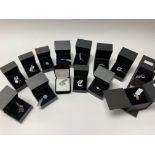 A collection of 14 stone set silver rings, all bra