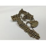 A 9carat gold gate bracelet with a padlock clasp w