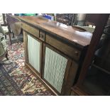 A faded early Victorian rosewood chiffonier fitted