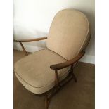 A single Ercol open arm chair with cushions. Appro