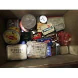 A Collection of vintage tins inside a wooden Playe