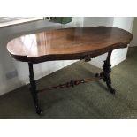 A Quality Victorian rosewood table with a shaped t