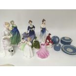 A collection of Royal Doulton and Coalport figures