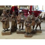 Six wooden carved figures of country folk