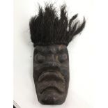 A small imitation mask with hair - NO RESERVE