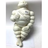 An Original Michelin Man advertising figure with iron wall bracket. 47cm.