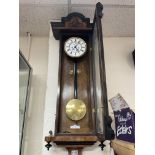 Walnut and ebonized regular wall clock