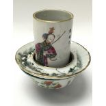 A Chinese decorated bowl and brush pot with markin