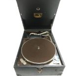 A HMV table top gramophone.
