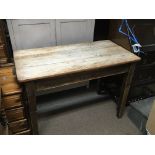 An old pine kitchen table the rectangular top abov