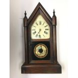 A Seth Thomas Connecticut wooden clock with painte