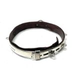 A hallmarked silver and leather mounted dog collar