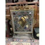 An arts and crafts leaded multicoloured glass and